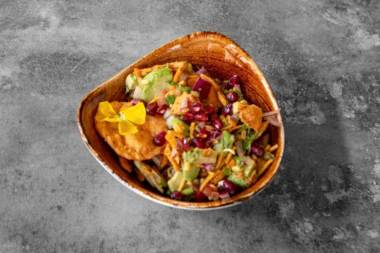 Avocado chaat with tangy chutneys, sev and herbs at Nukkad Café, Glasgow