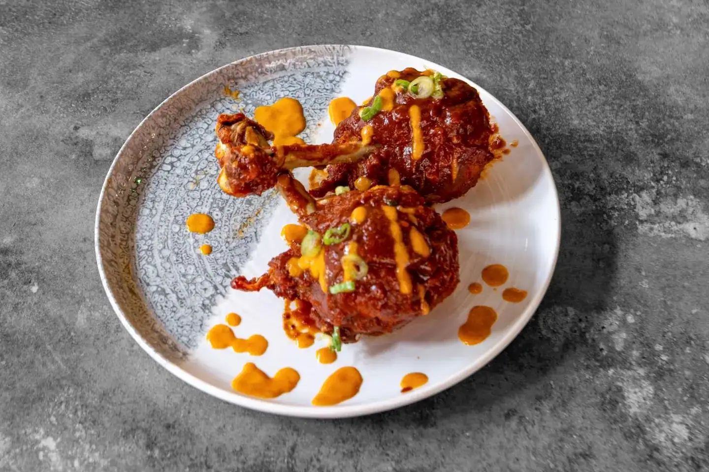 Dragon chicken lollipop at Nukkad Café, Glasgow: crispy chicken lollipops tossed in a fiery dragon sauce with garlic and chillies