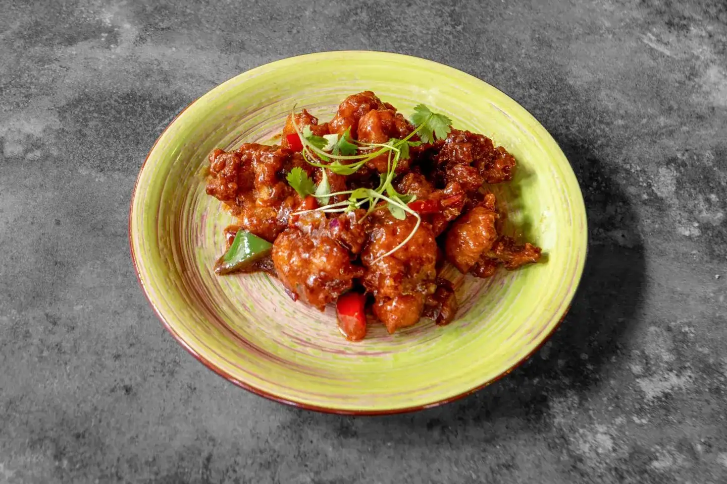 Gobhi Manchurian, crispy cauliflower in a rich Indo-Chinese gravy, at Nukkad Café, Glasgow
