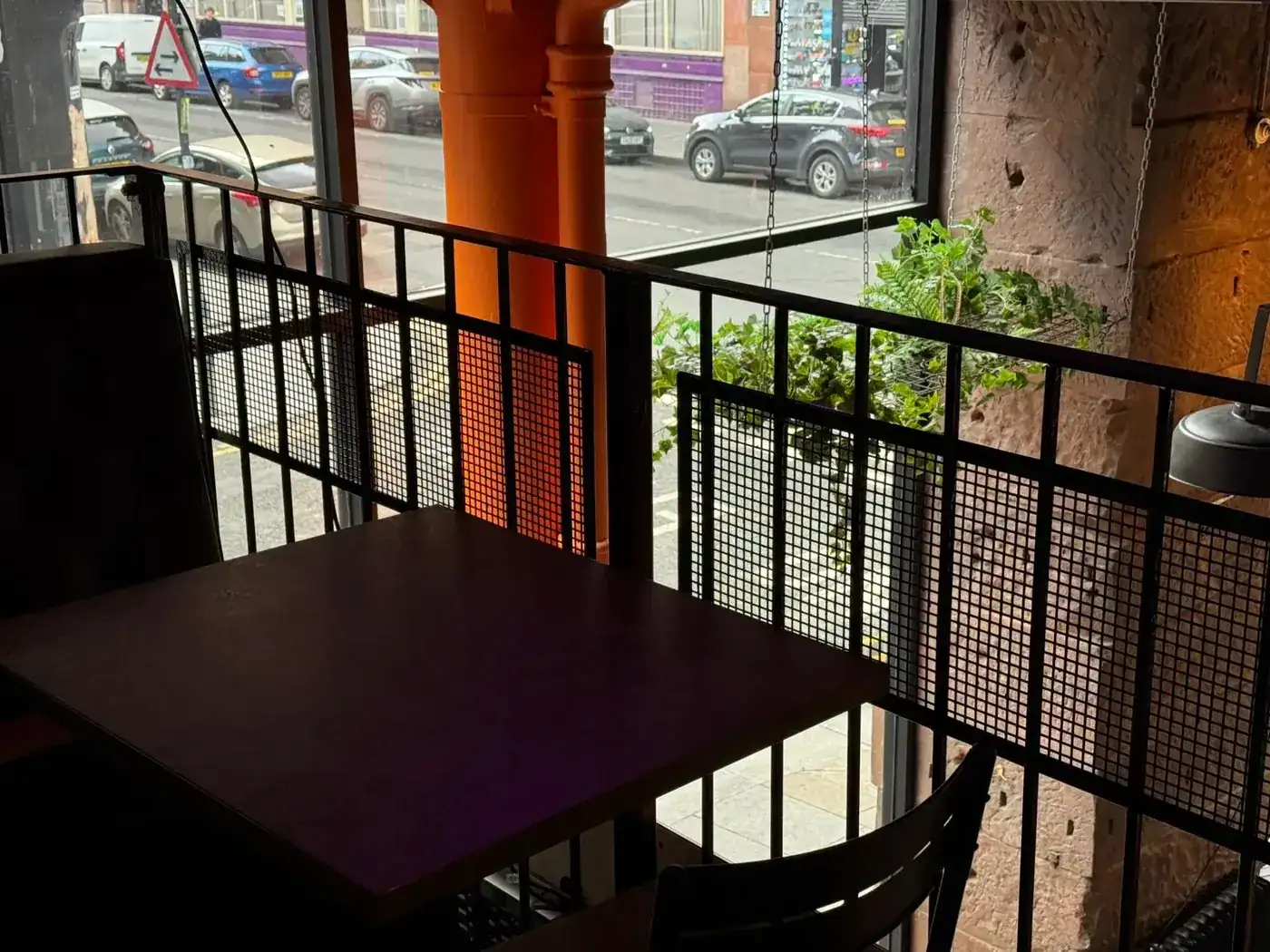 Tables by the window at Nukkad Café