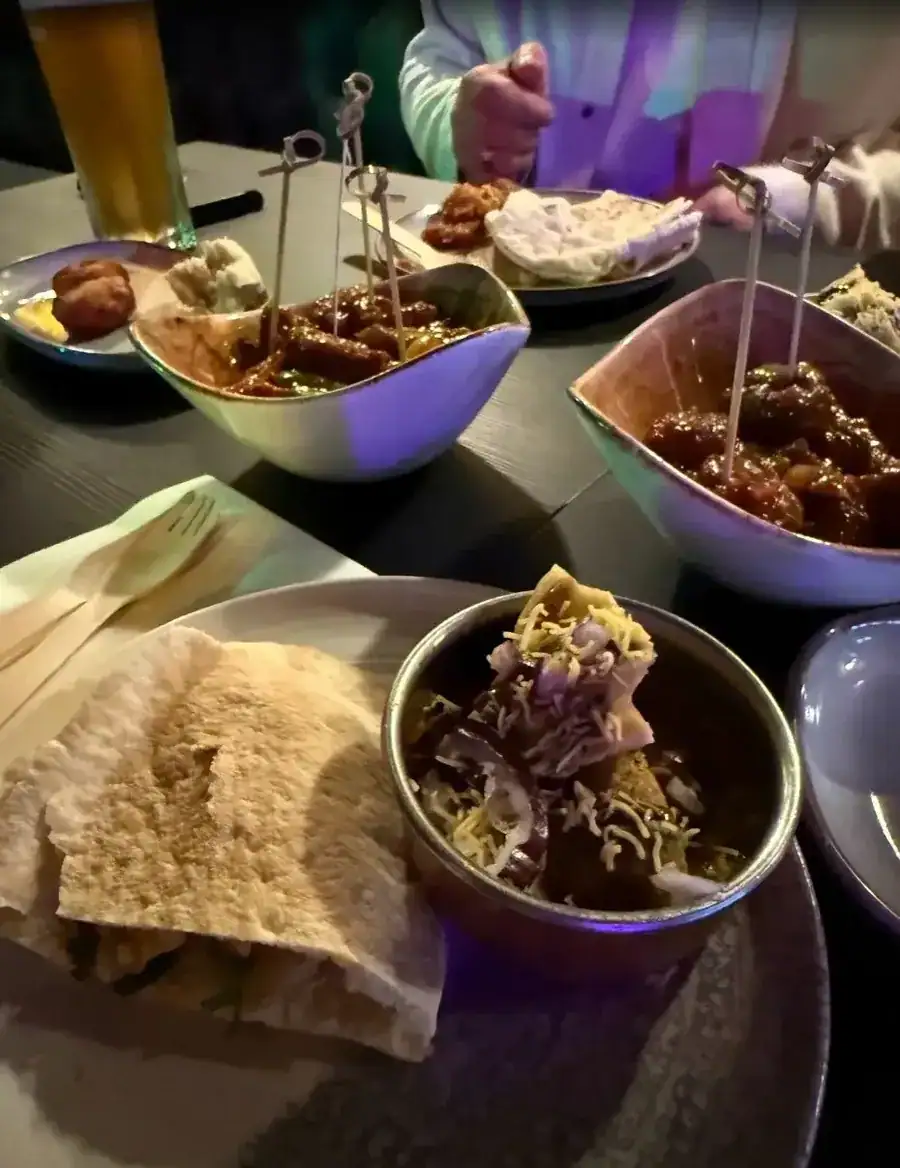 A spread of Nukkad Café dishes on the table