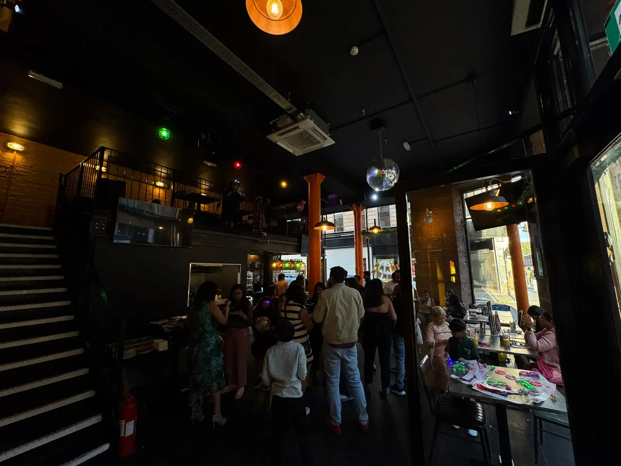 A busy evening at Nukkad Café, Glasgow, with a full dining room